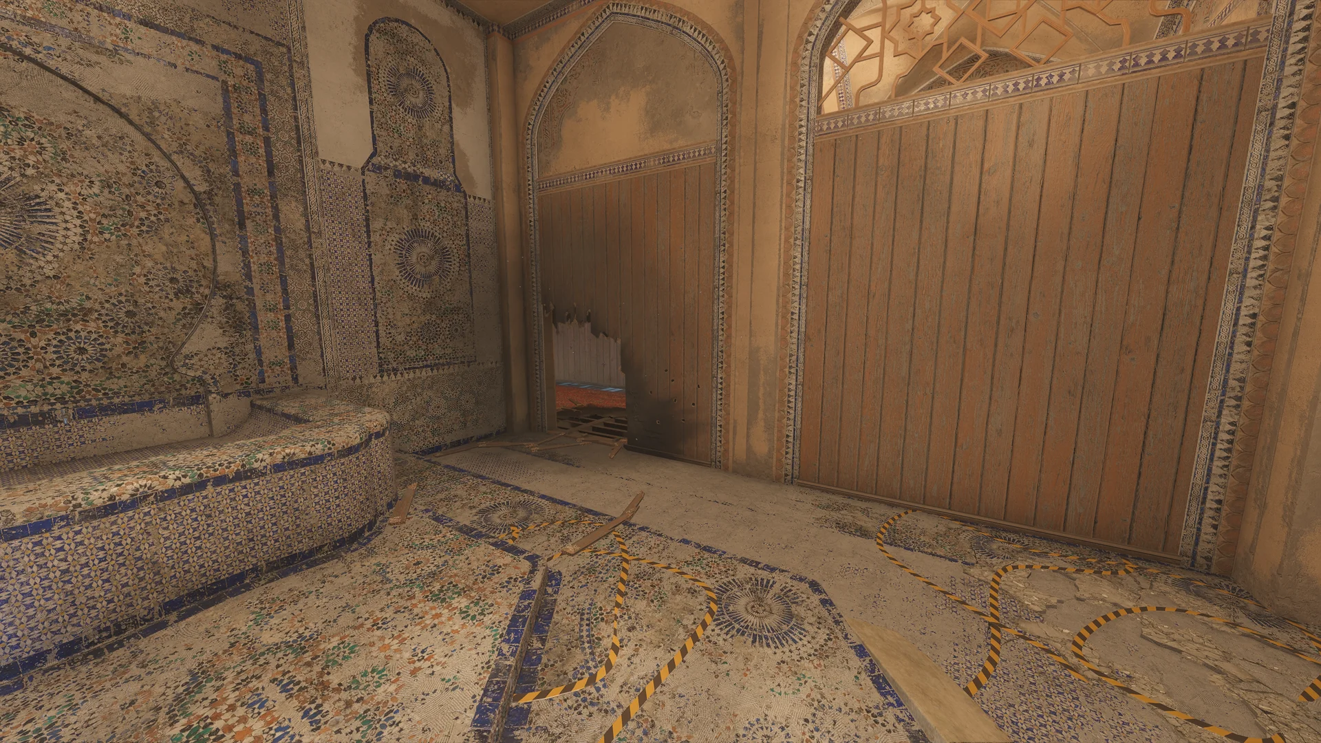 Mosaic-tiled room on Border 2F with a curved tiled ledge, black-and-yellow tape on the floor, and an arched doorway whose wooden panel is torn open at the base