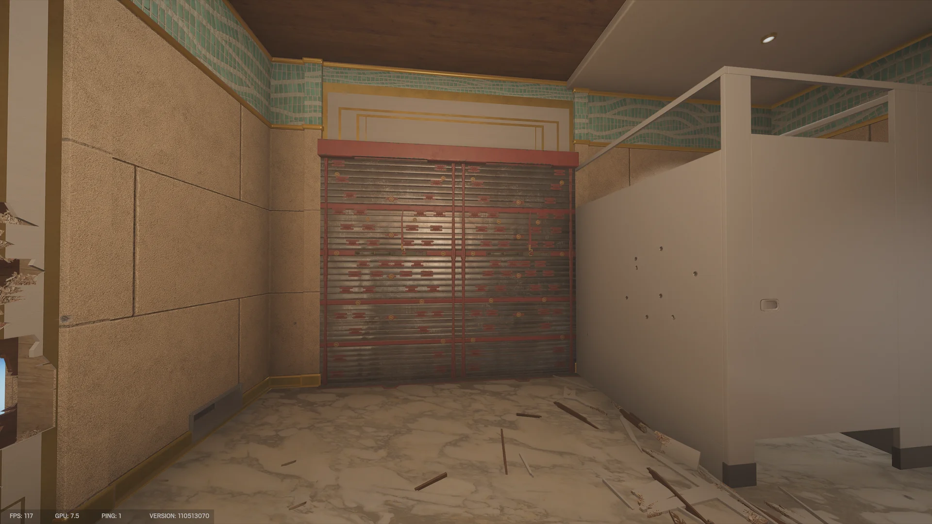 Restroom on Calypso Casino 1F with stall partitions, teal mosaic trim, a reinforced wall and splinters on the marble floor
