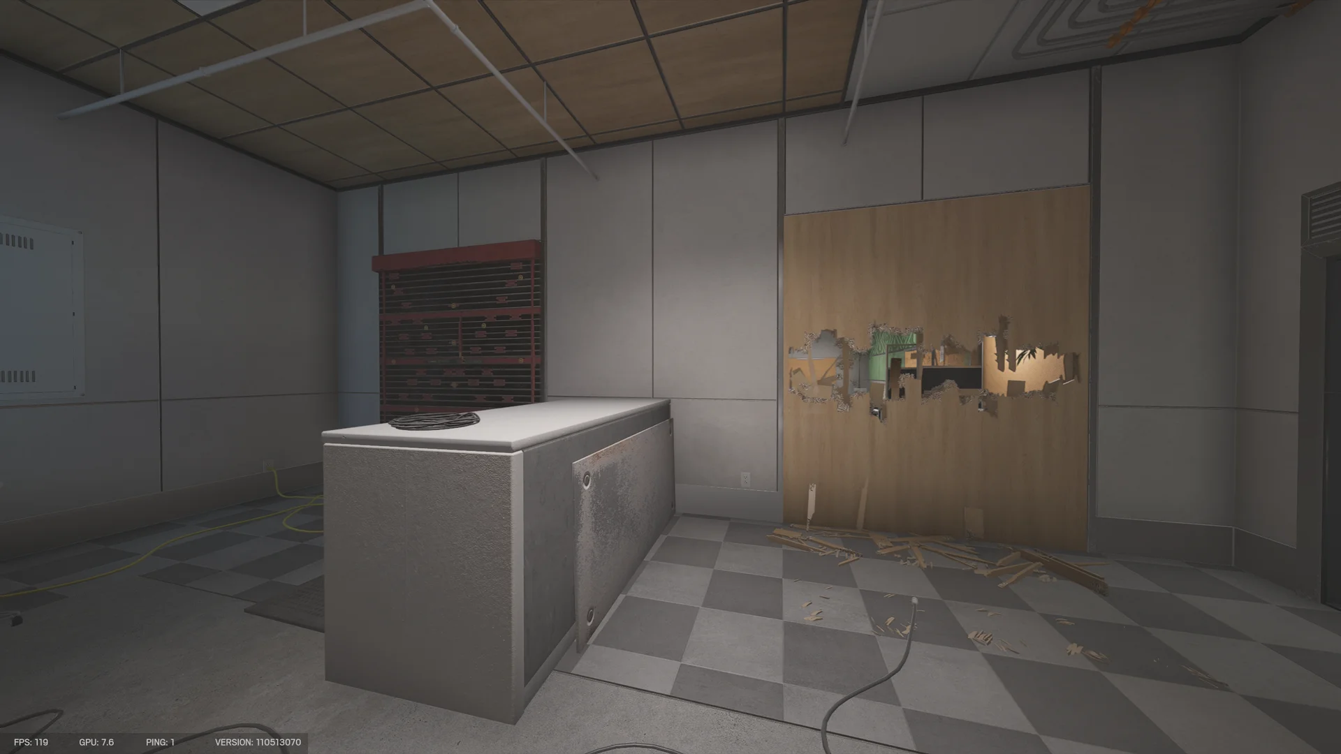 Utility room in the Calypso Casino basement with a metal counter, a reinforced wall, and holes through a wooden panel