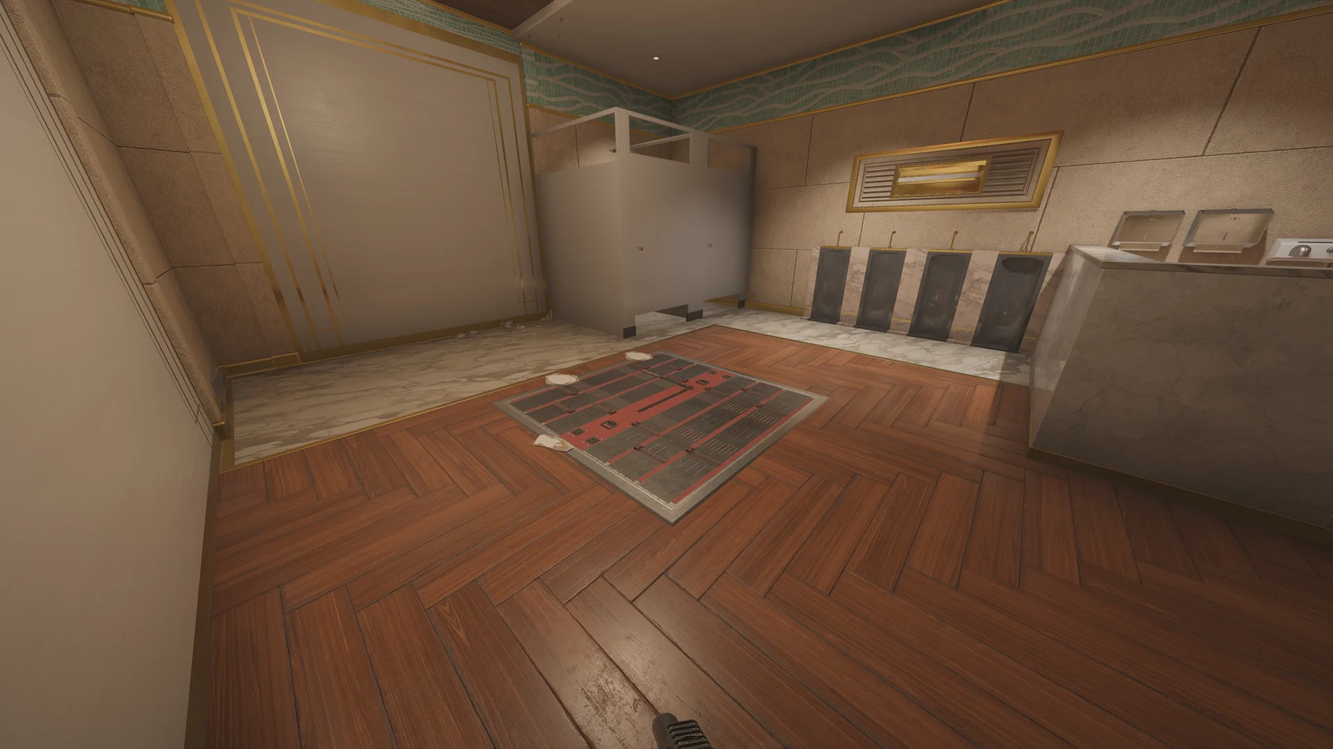 Restroom on Calypso Casino with urinals along a marble wall, toilet stalls, and a reinforced hatch set into the parquet floor