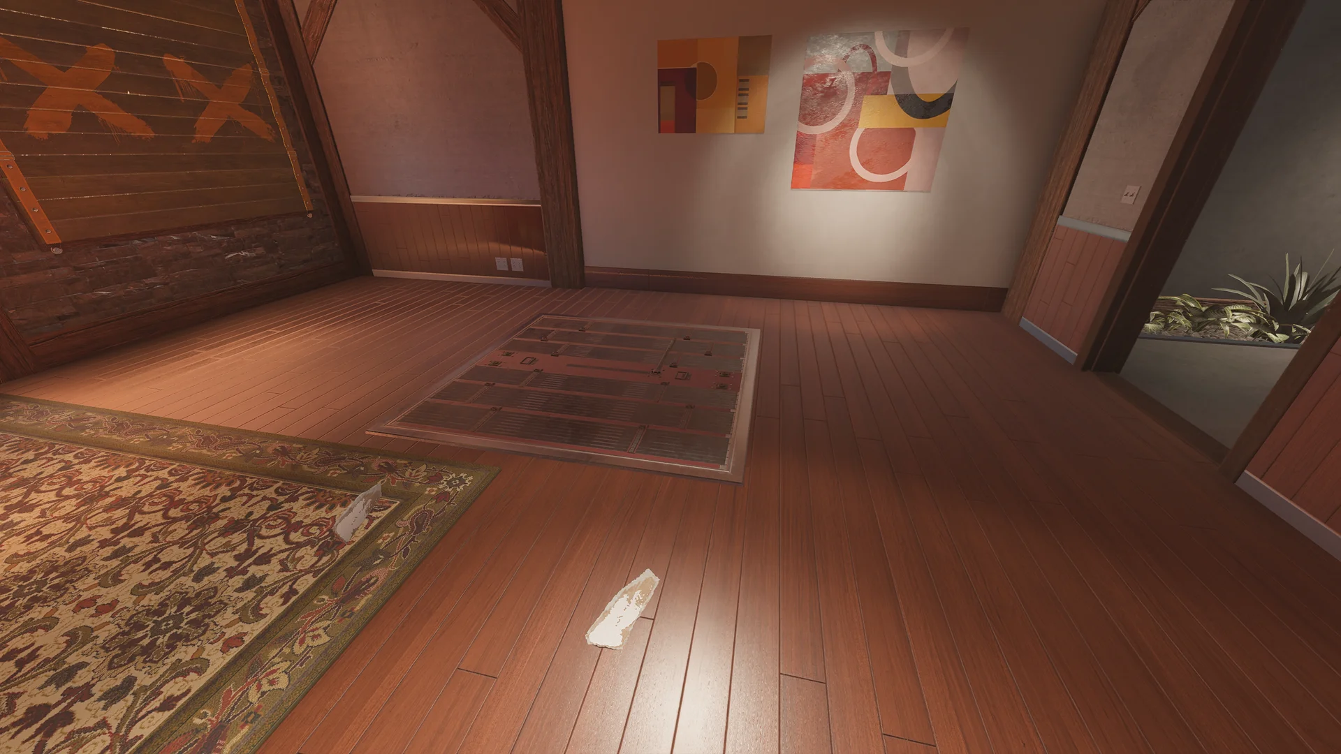 Room on Chalet 1F with a reinforced floor hatch, abstract paintings, a patterned rug, and an X-marked wooden barricade