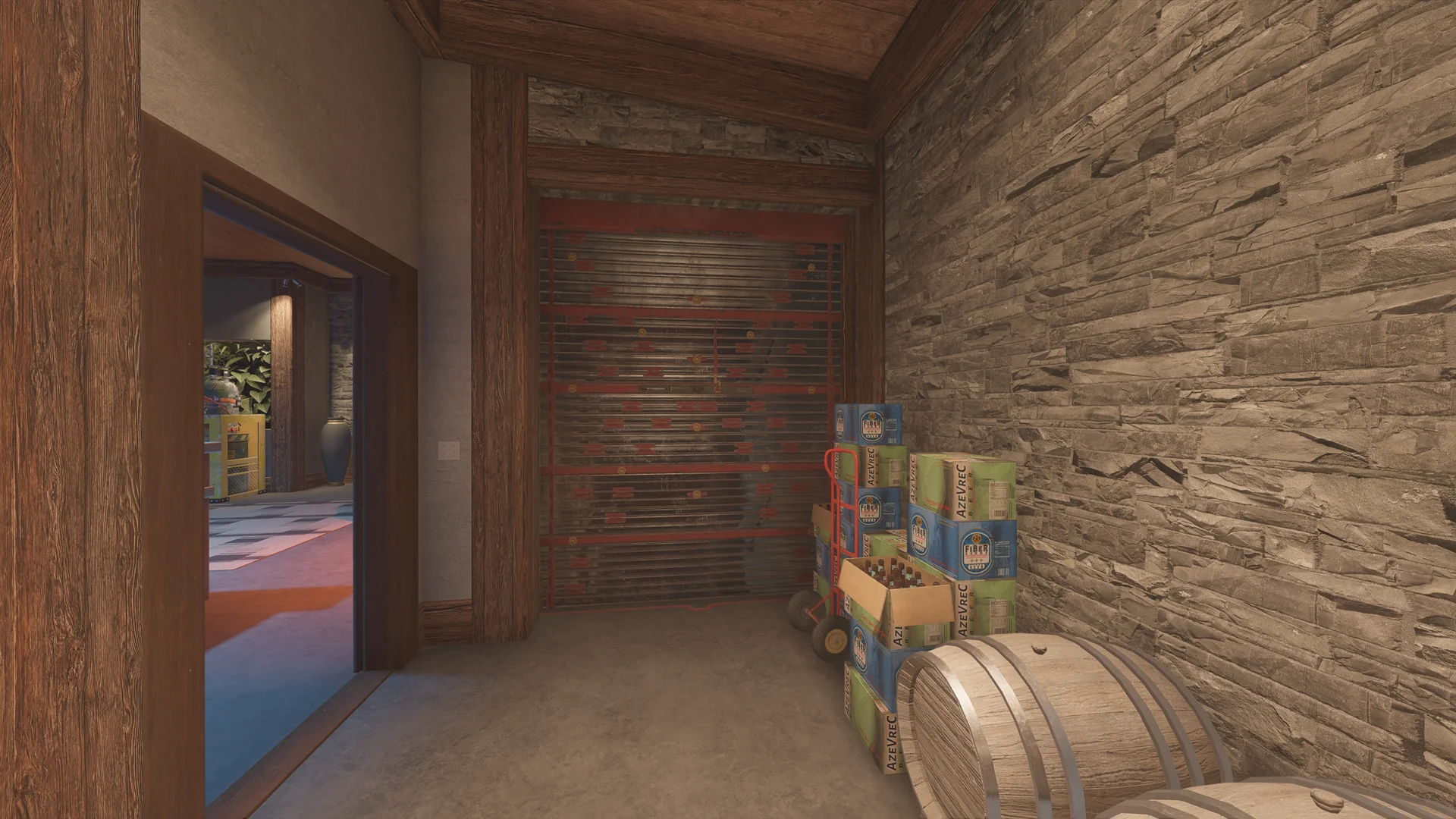 Stone-walled nook on Chalet 1F with a reinforced wall, stacked beverage crates on a hand truck, and wooden barrels