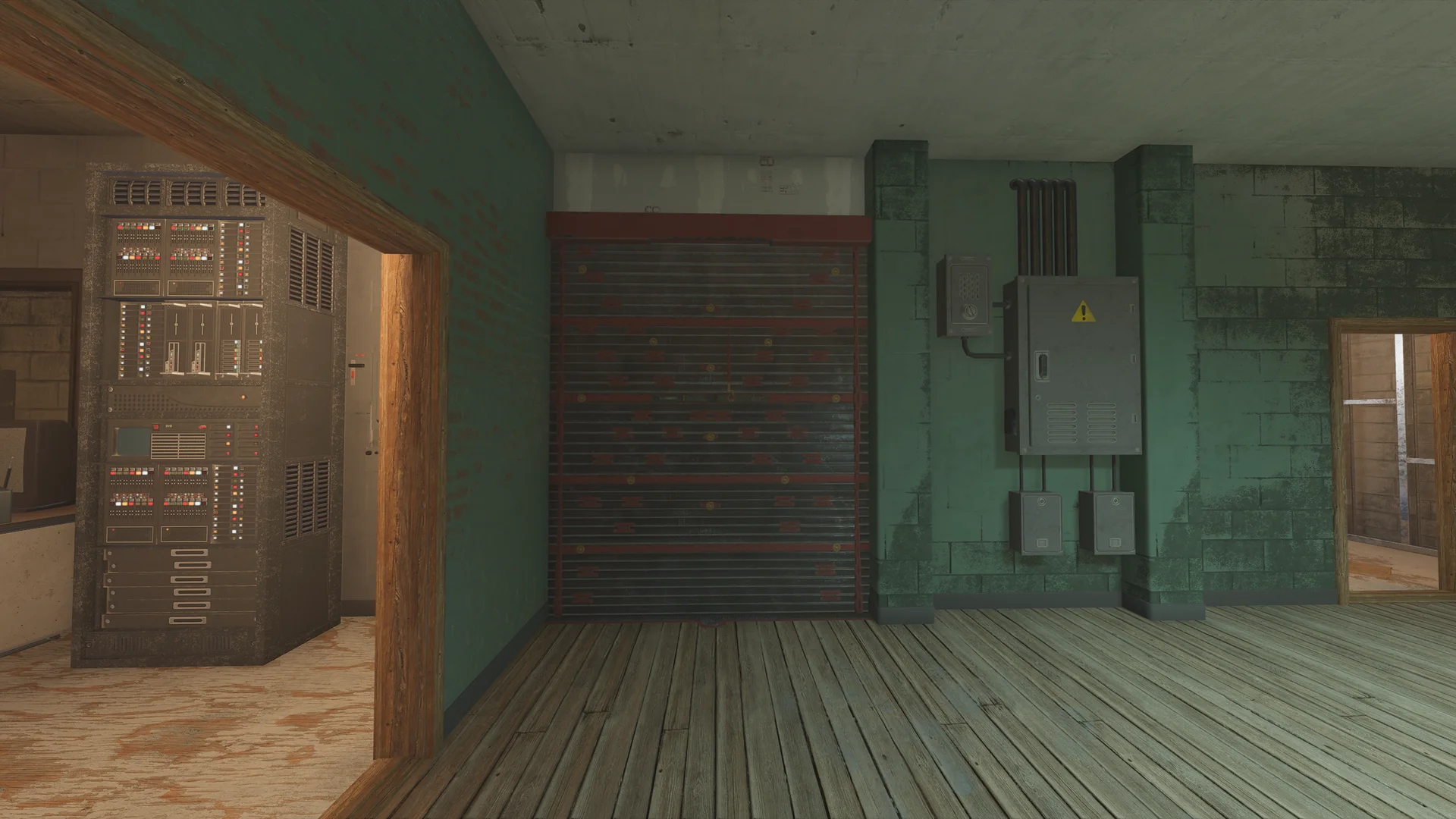 Green room on Club House 2F with a reinforced shutter wall, an electrical panel, and an open doorway showing a rack of electronics