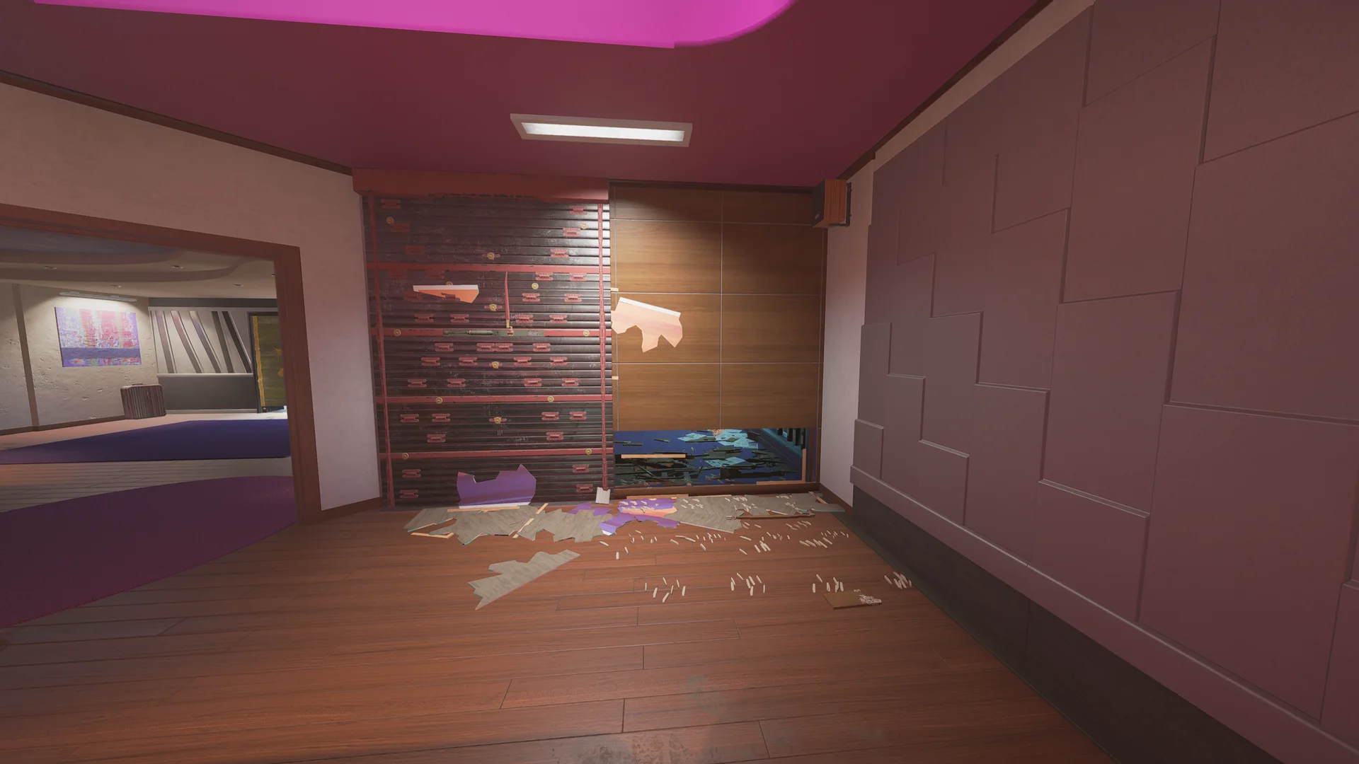 Dark red room on Coastline 2F with a reinforced shutter wall and a breach hole through a pink-tiled wall to a blue stairwell beyond