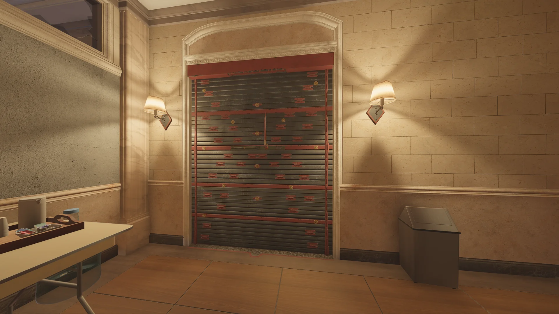 Stone-walled room in the Consulate with an arched reinforced shutter flanked by two wall lamps, a table at left and a bin at right