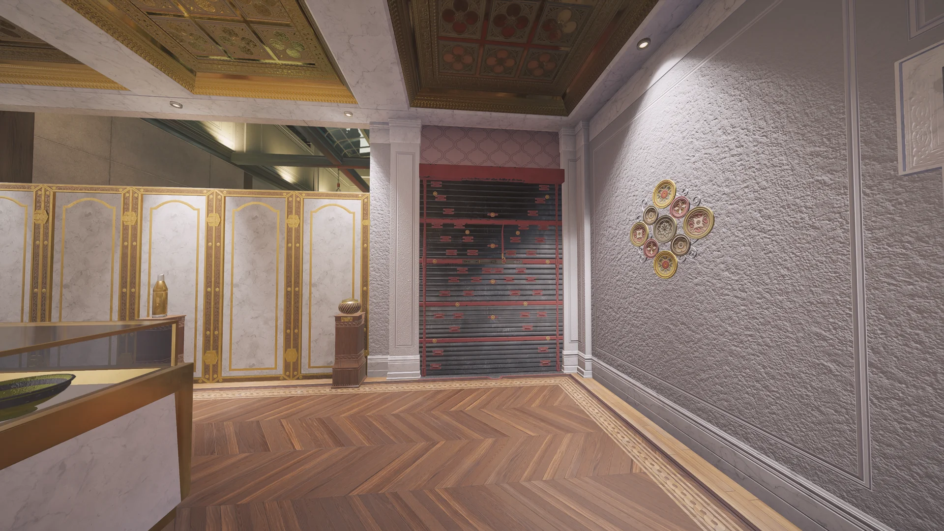 Ornate hall on Emerald Plains 2F with a reinforced shutter between marble pilasters, a gilded ceiling, and decorative plates on the wall