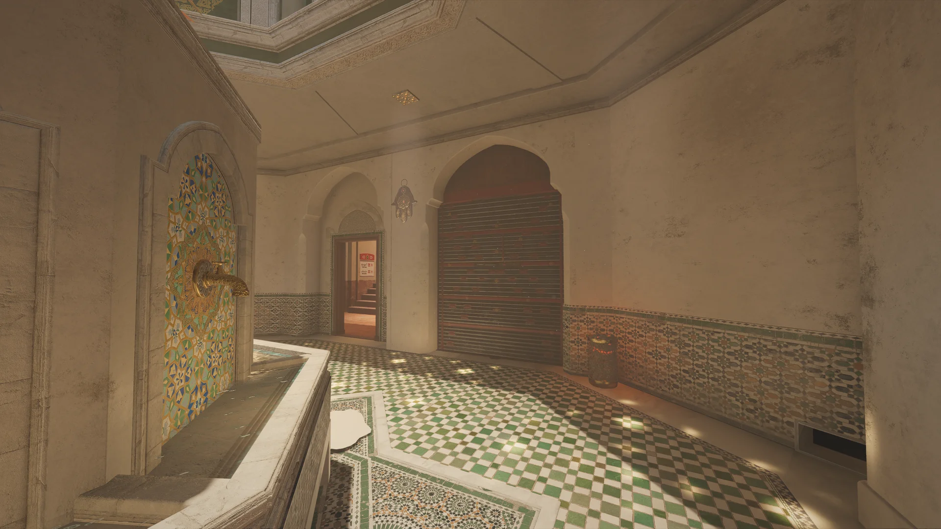 Bathhouse on Fortress 1F with a mosaic-tiled fountain, a reinforced shutter in an arched recess, a skylight, and green mosaic tile flooring