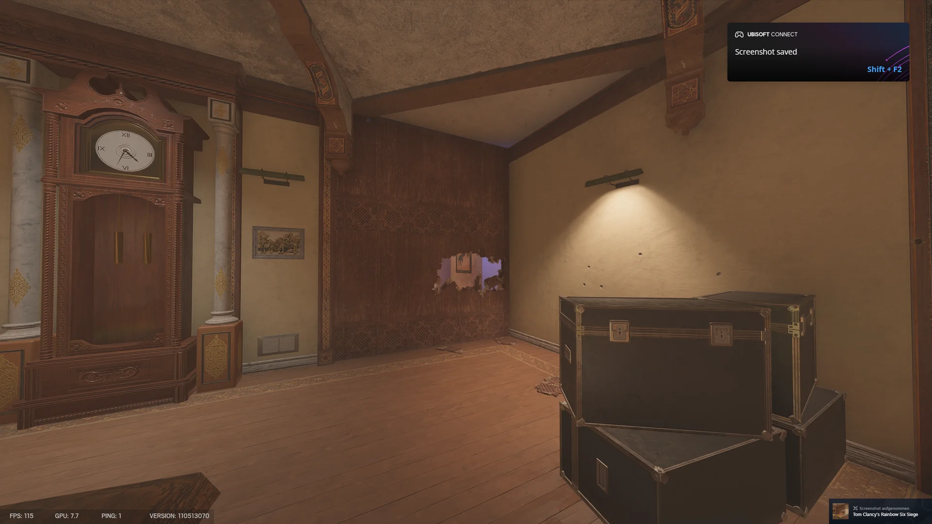 Ornate room on Fortress 2F with a grandfather clock, a breach hole through a wood-panel wall, road case trunks, and a wall picture light