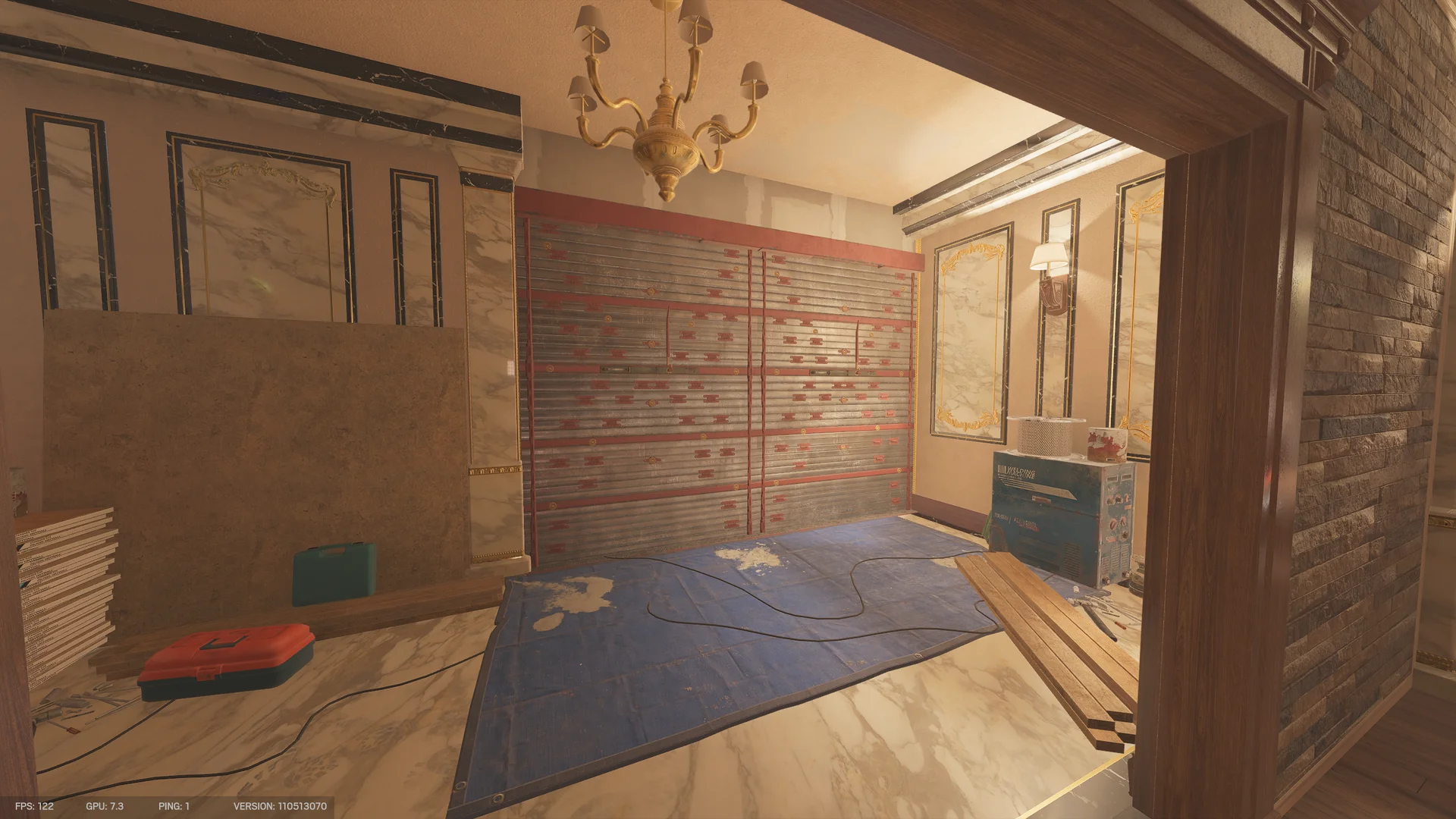 Marble room on Kafe Dostoyevsky 2F with a reinforced shutter, a floor tarp, a welding machine, a toolbox, and stacked planks
