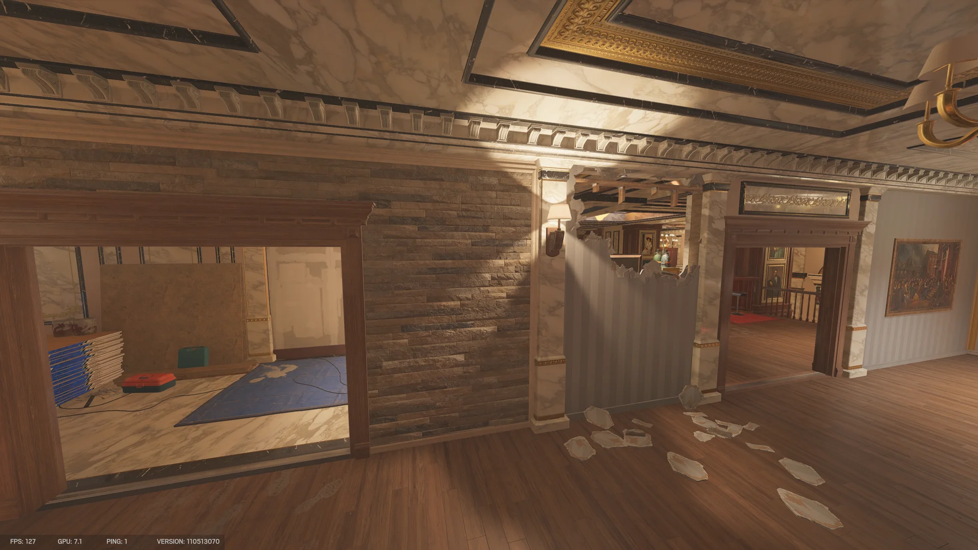 Grand landing on Kafe Dostoyevsky 3F with a stone accent wall, an opening to a room under renovation, and a breach hole to a lit bar area
