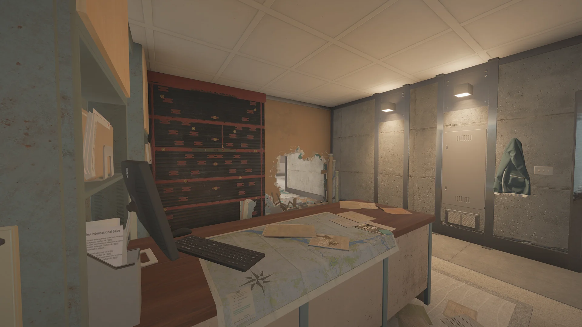 Office on Kanal 1F with a desk holding a monitor and a map, a reinforced shutter, a wall breach hole, and lockers with a hanging jacket