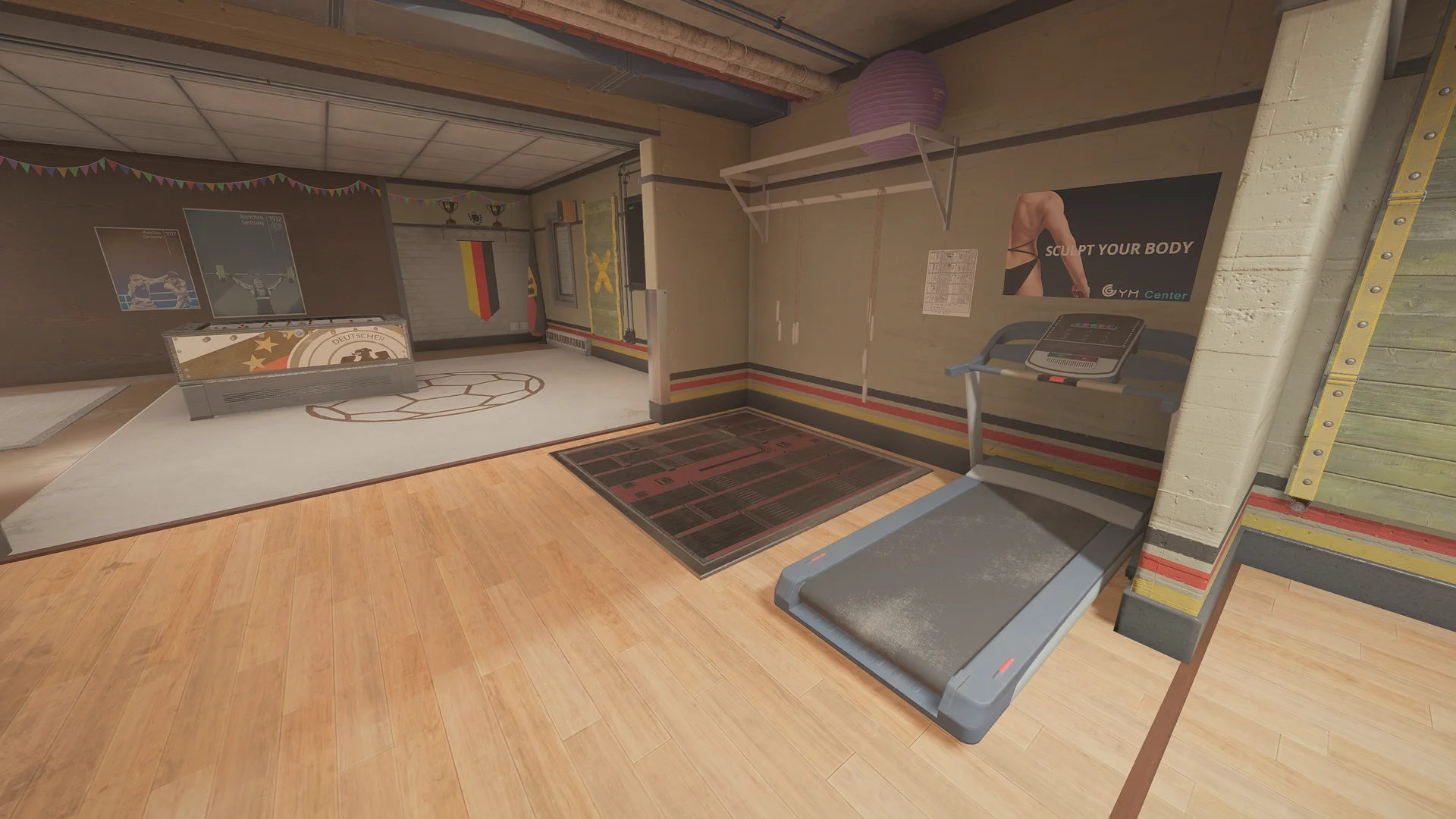 Gym in the Kanal basement with a treadmill, a foosball table, a fitness poster, a reinforced shutter, and a reinforced floor hatch