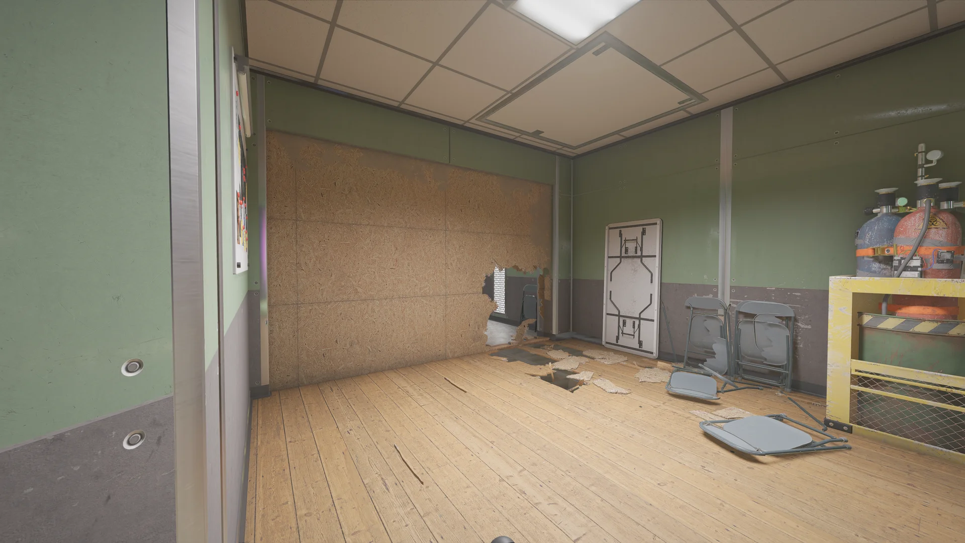 Meeting room on Lair 1F with folding chairs and a folded table, an OSB-patched wall, a broken floor section, and gas cylinders on a cart