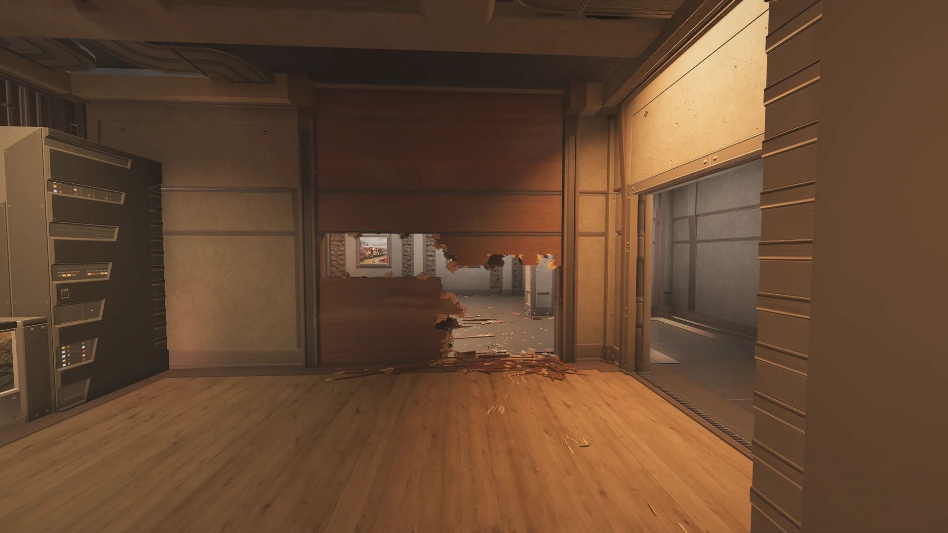 Room on Lair 2F with a server rack, a wood-panel wall with a large breach hole to an adjacent room, a doorway, and wood debris on the floor