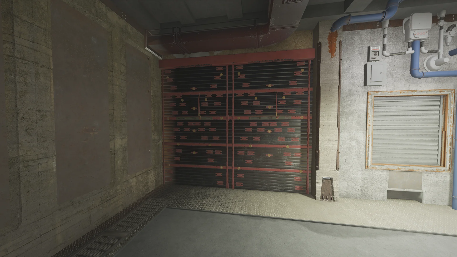 Utility room in the Lair basement with a reinforced shutter, overhead ducts, wall pipes with a valve, a louvered vent, and a floor grate