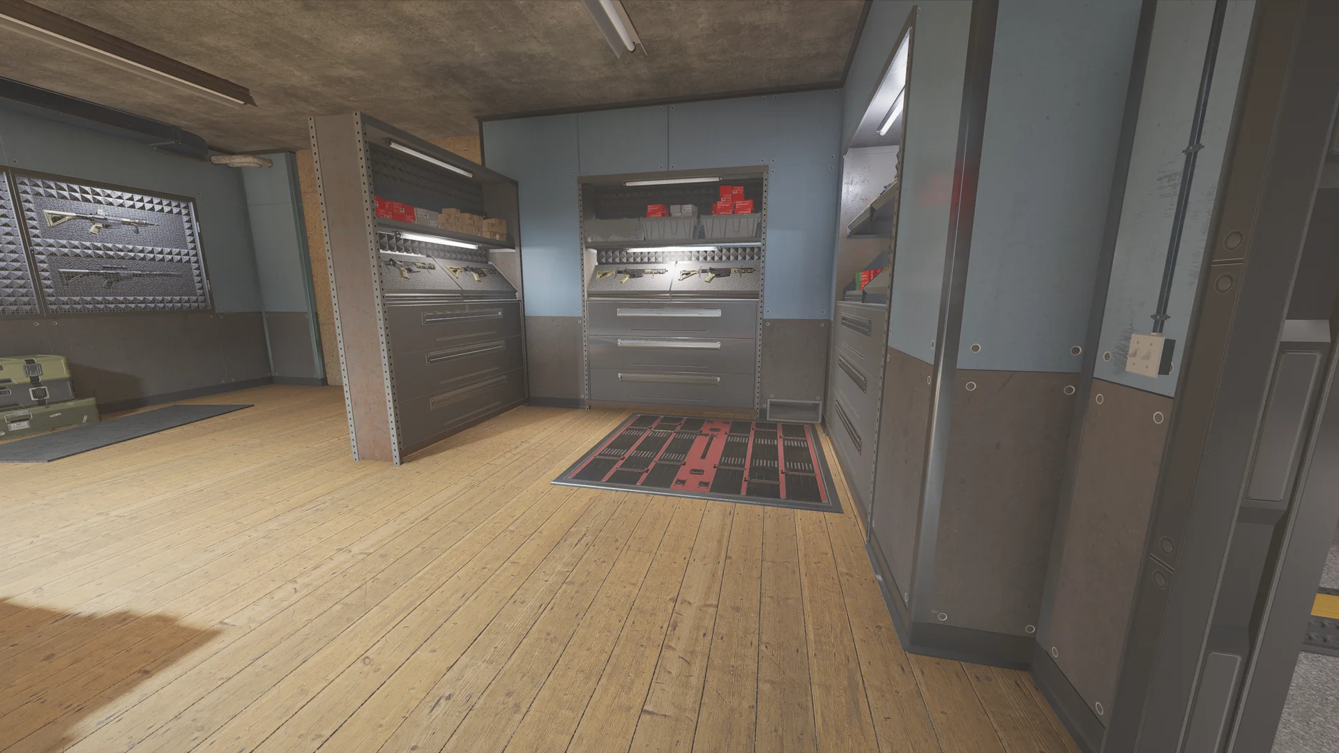 Armory in the Lair basement with wall cabinets displaying rifles and pistols, ammunition boxes, drawer units, and a framed weapon display