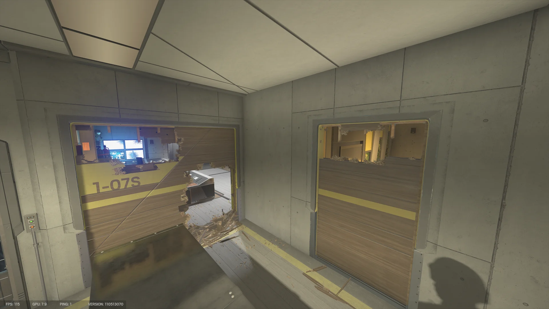 Two broken wooden roll-doors on Nighthaven Labs 1F, one labeled 1-07S, with splinters and monitor desks visible beyond
