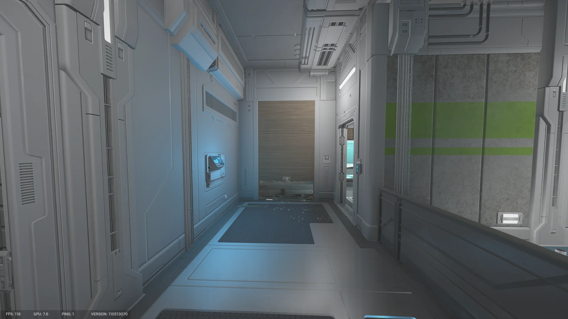 White corridor in the Nighthaven Labs basement leading to a lowered wooden roll-door with splinters along its base