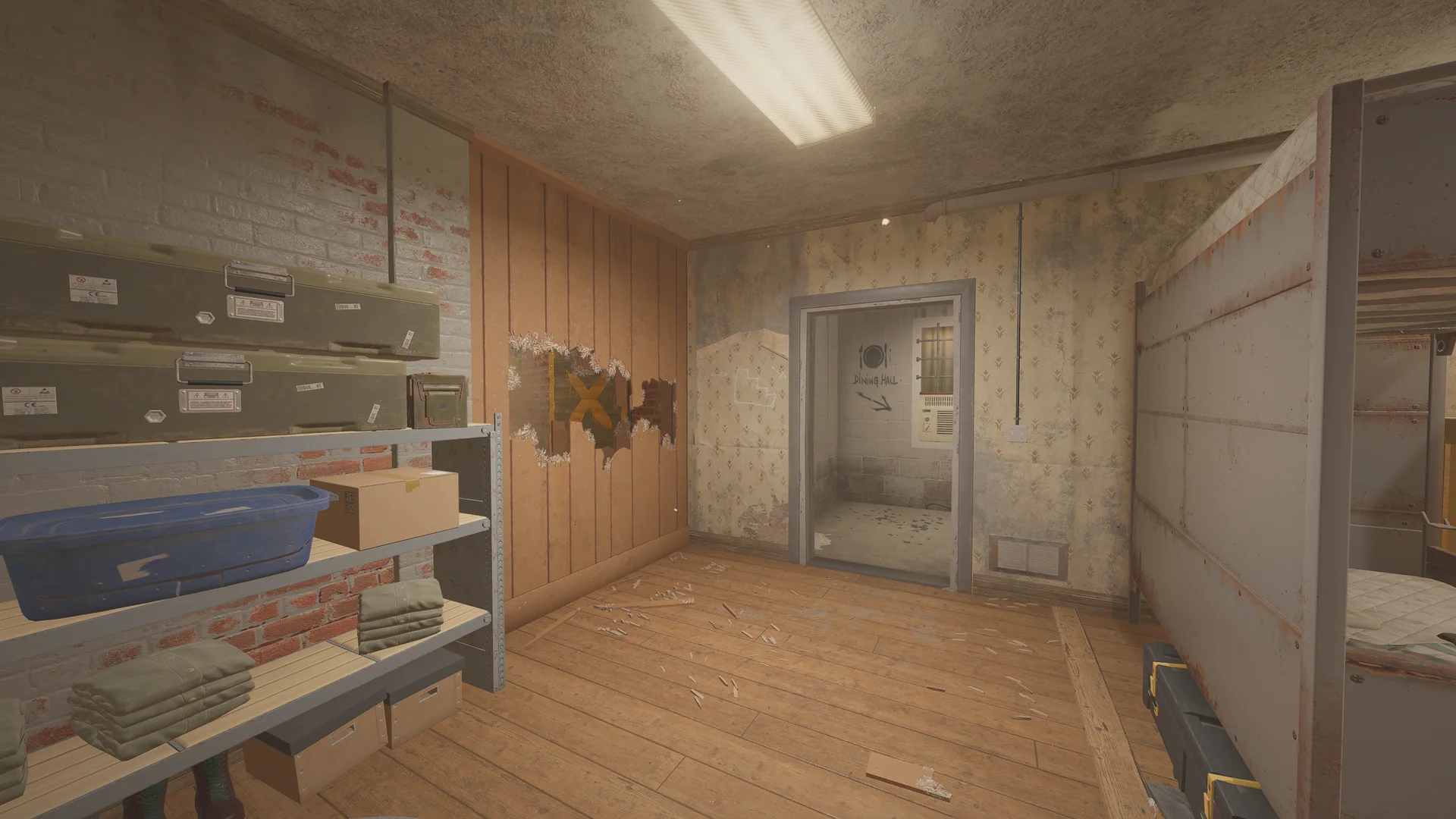 Storage room on Oregon with shelved clothing, ammo cases and a breached wood panel, an arrow sketched beside a doorway