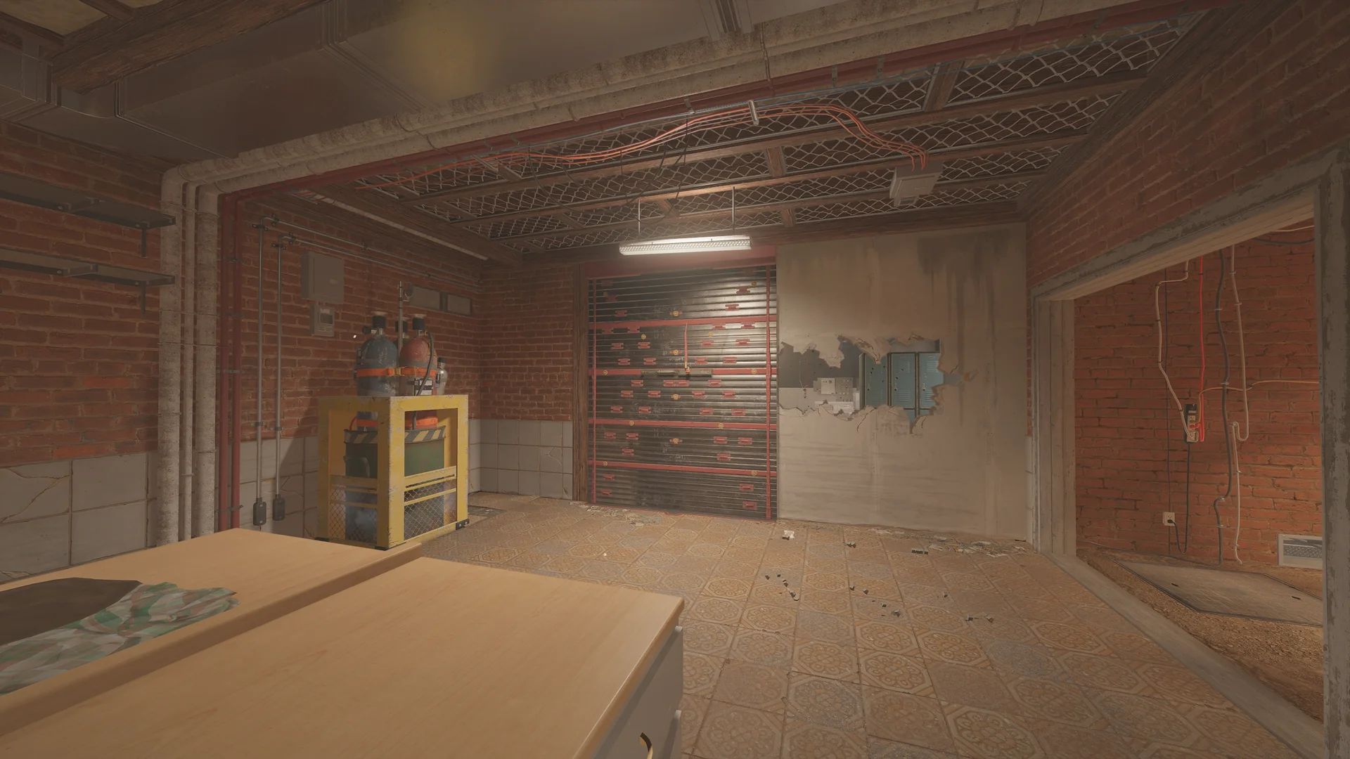 Room in the Oregon basement with gas cylinders in a yellow cage, a reinforced shutter and a breach revealing green lockers