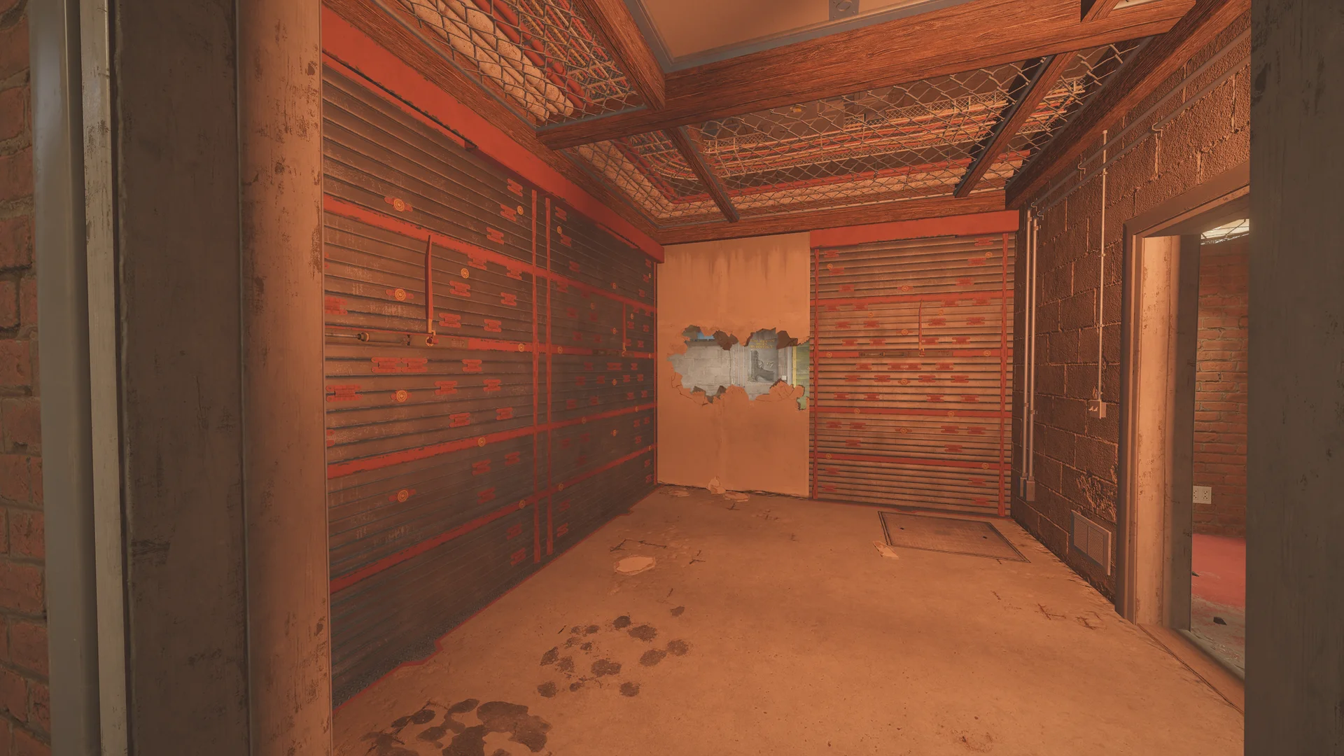 Room in the Oregon basement with two reinforced shutters flanking a breached drywall patch under a chain-link mesh ceiling