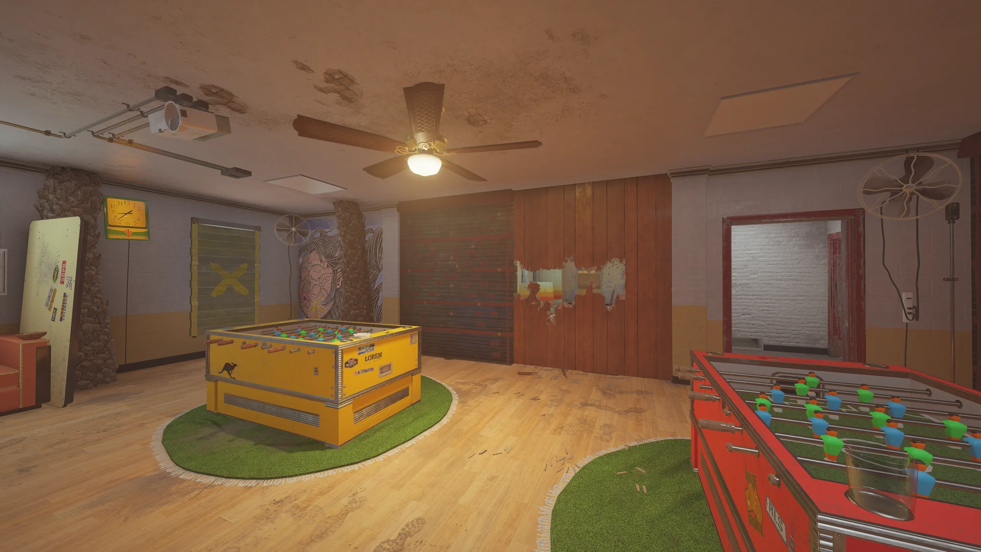 Games room on Outback 2F with foosball tables on round rugs, a ceiling fan, a wall mural and a breached panel by a shutter