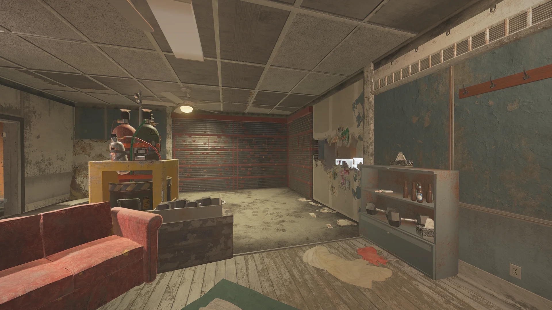 Worn room on Theme Park 2F with a red couch, a shelf with a dumbbell and bottles, gas cylinders, and a slatted shutter